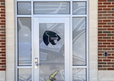Custom Window Graphics entrance to locker rooms Whitney